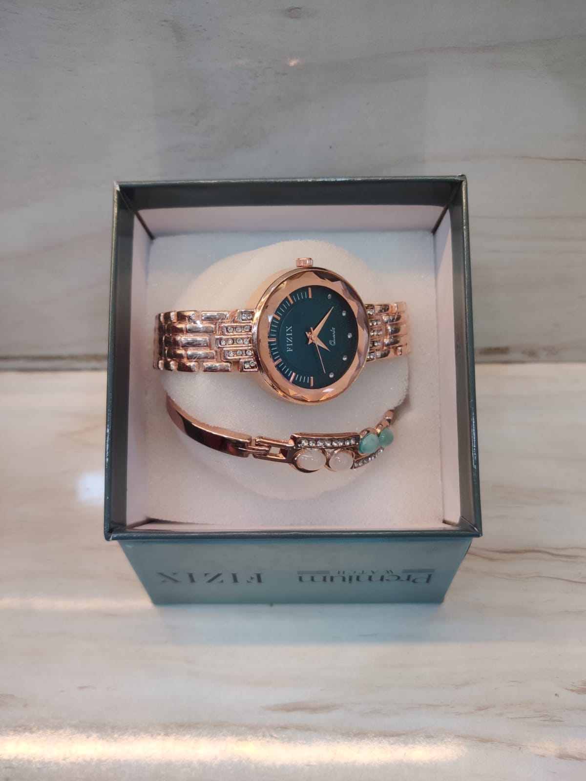 Golden Watch with Dark Emerald Dial and Matching Stone Bangle