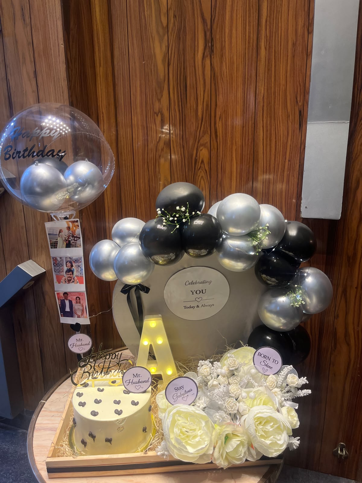 Black and Silver Hamper with cake, balloons and flowers { Alphabet Initial and Polaroid extra Rs500}