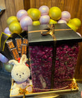 Suprise Rose Petal Cake Box With Balloon Teddy and chocolates