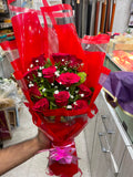 12 roses Bouquet ( Sheet Design may change as per availability)