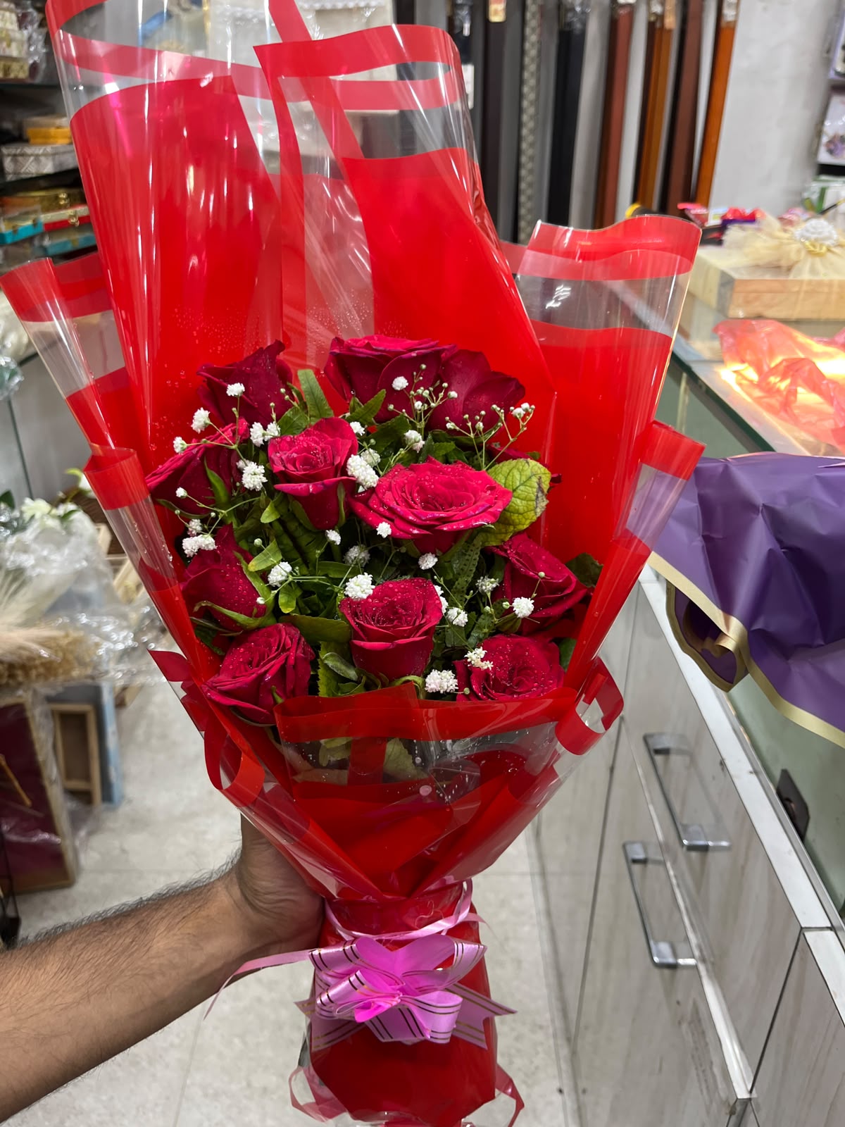 12 roses Bouquet ( Sheet Design may change as per availability)