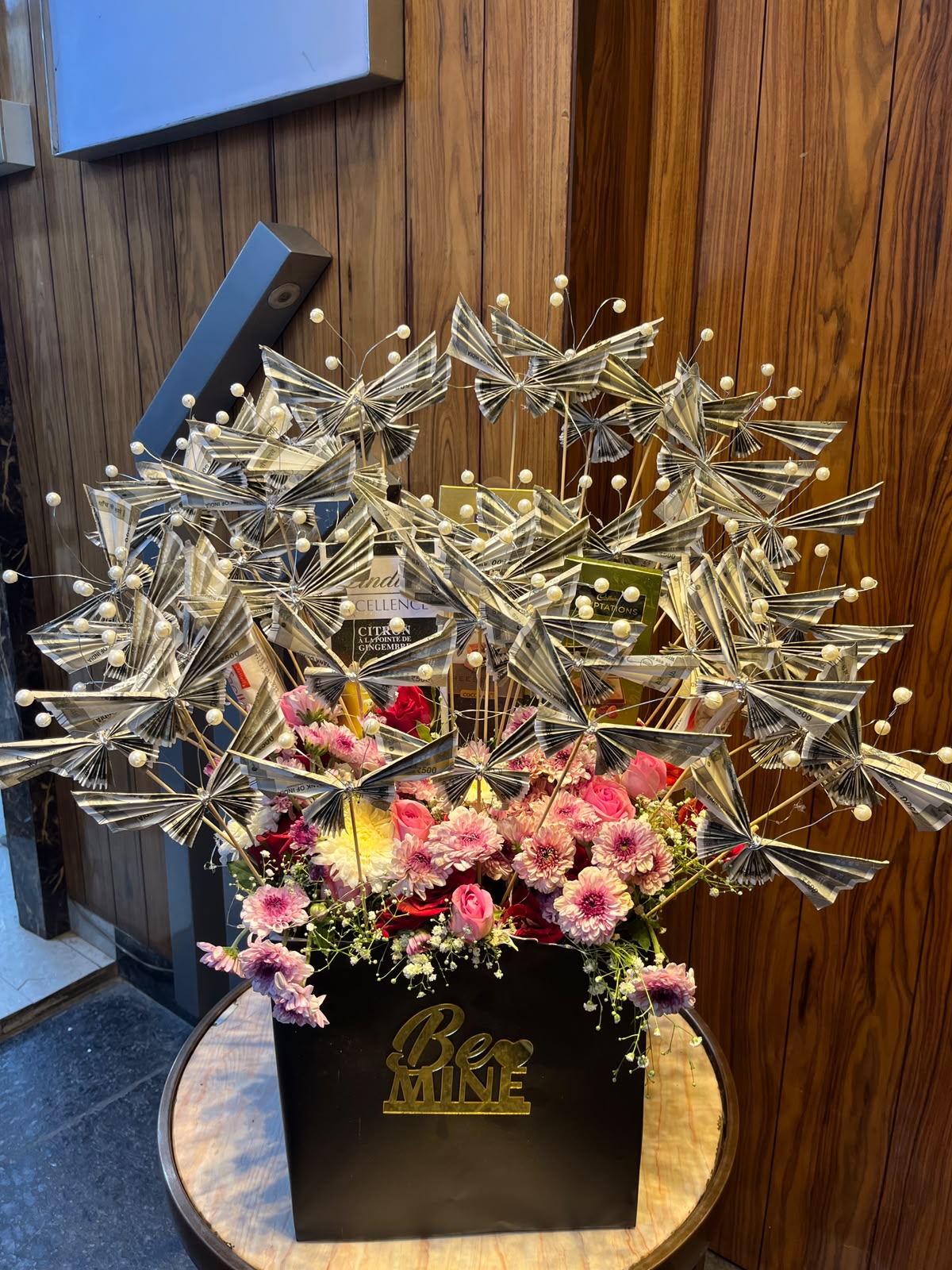 51,000/- with fresh flowers ( Chocolates are extra chargable)